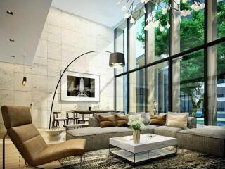 Spacious and modern living room with large windows and natural light
