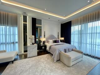 Elegant modern bedroom with abundant natural light