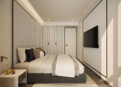 Modern bedroom interior with a sleek design, featuring a large bed, mounted TV, and built-in closets