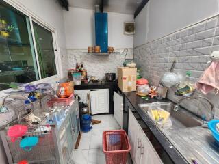 Modern kitchen with stainless steel appliances and ample countertop space