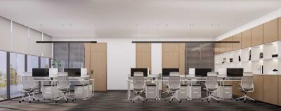 Modern open-plan office space with multiple workstations
