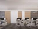 Modern open-plan office space with multiple workstations