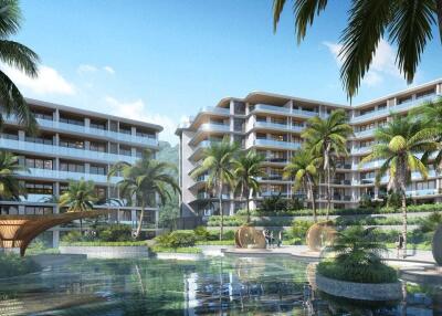 Modern tropical resort-style apartment complex with lush landscaping and water features