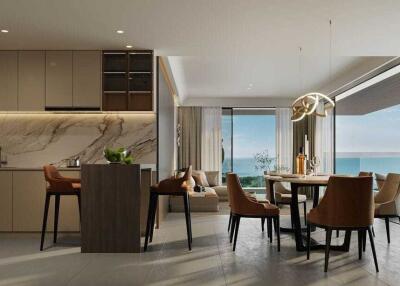 Modern kitchen with a dining area overlooking the ocean