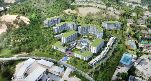 Aerial view of a residential apartment complex surrounded by greenery