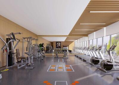 Modern gym facility with cardio and weight machines in a well-lit space