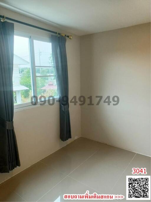 Minimalist bedroom with window and tiled flooring