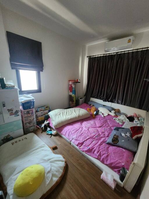 Cozy bedroom with personal belongings and children