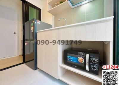 Compact modern kitchen with built-in appliances