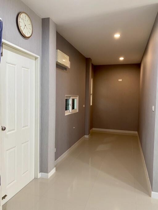 Elegant residential hallway with neutral color tones