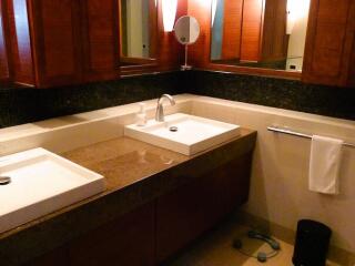 Spacious bathroom with double sink and modern fixtures