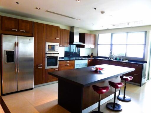 Modern kitchen with stainless steel appliances and center island