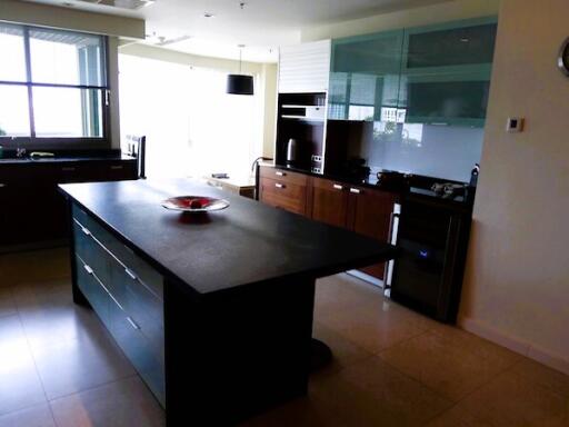 Modern kitchen with integrated appliances and central island