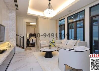 Modern living room with marble flooring and elegant furniture