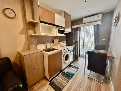 Modern kitchen with integrated appliances and open plan layout