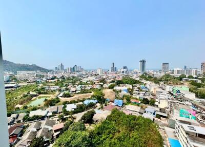 Panoramic city view from a high-rise building balcony