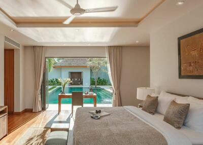Spacious bedroom with direct pool access and modern decor