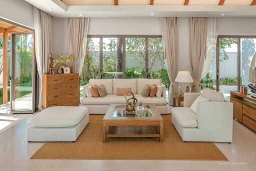 Spacious and well-lit living room with modern decor