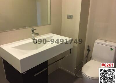 Modern bathroom interior with sink and toilet