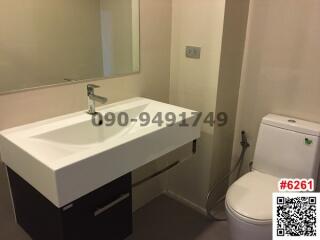 Modern bathroom interior with sink and toilet