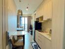 Compact apartment interior with integrated kitchen and dining area