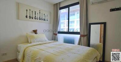 Cozy bedroom with natural light and modern decor