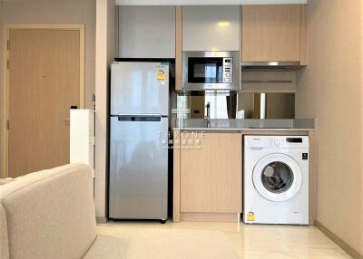 Modern compact kitchen with appliances