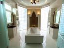 Luxurious spacious bathroom with bathtub and stylish fixtures