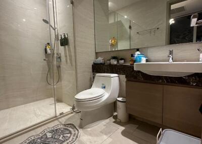 Modern bathroom with shower and ample countertop space