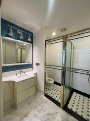 Modern bathroom with glass shower and elegant vanity