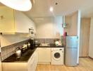 Compact kitchen with modern appliances and ample counter space