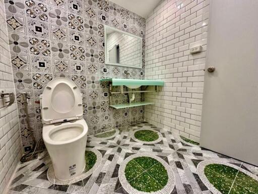 Modern bathroom with patterned tiles