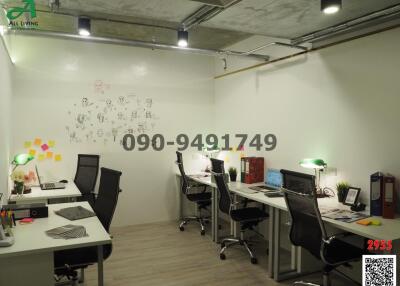 Modern office space with workstations and open-concept design
