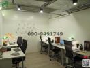 Modern office space with workstations and open-concept design