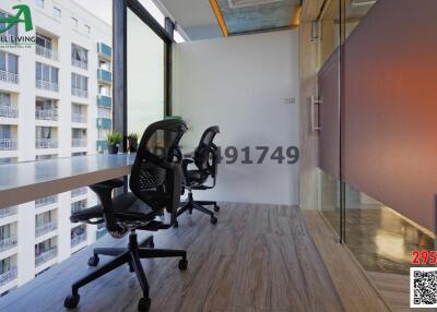 Modern office space with city view through large windows
