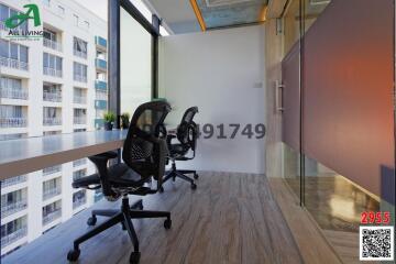 Modern office space with city view through large windows