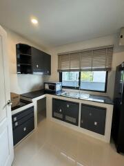 Modern kitchen with stainless steel appliances and clean design