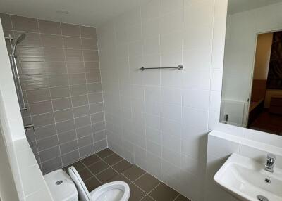 Modern bathroom with white tiles