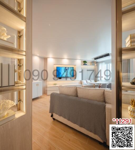 Cozy modern bedroom with a comfortable bed and a television