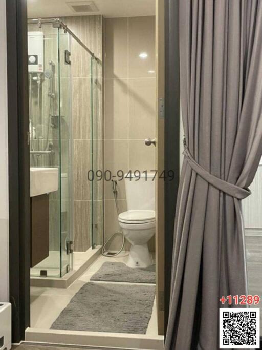 Modern bathroom with glass shower and elegant finishes