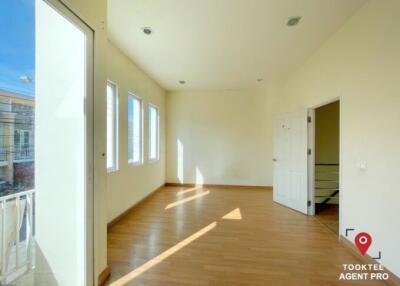 Spacious and well-lit living room with large windows