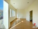 Spacious and well-lit living room with large windows