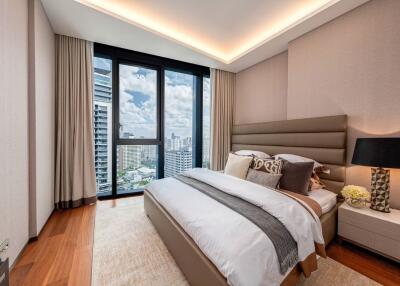 Modern bedroom with large windows and city view