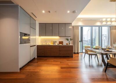 Modern kitchen and dining area with city view