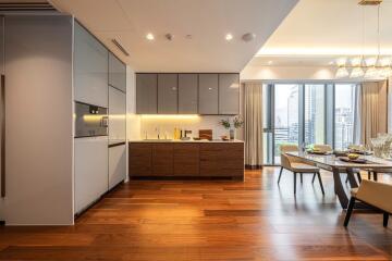 Modern kitchen and dining area with city view