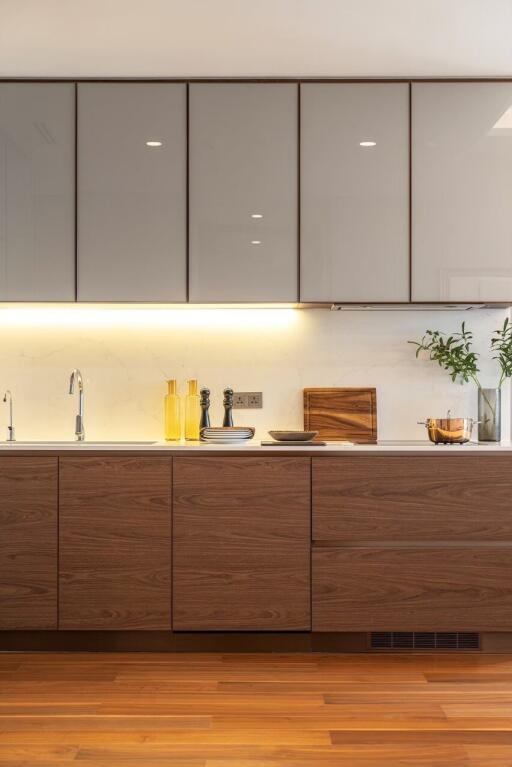 Modern kitchen with wooden cabinets and stainless steel appliances