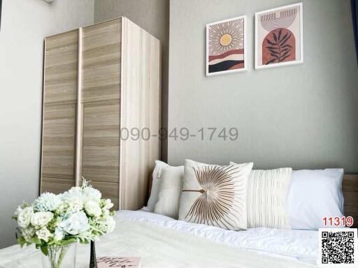 Modern bedroom with stylish decor and ample natural light