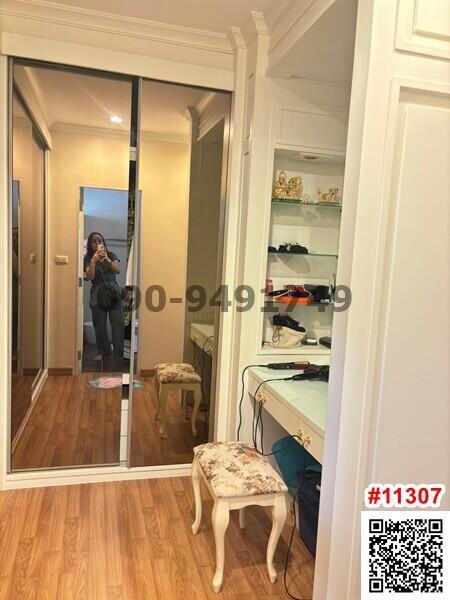 Spacious bedroom with walk-in closet and elegant French doors