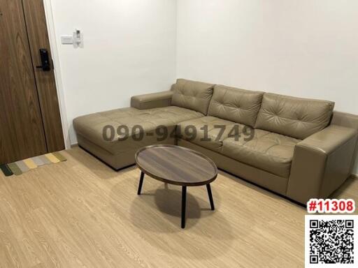 Modern living room with beige sofa and wooden coffee table