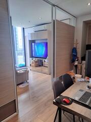 Modern living room with sliding door and a glimpse of the balcony